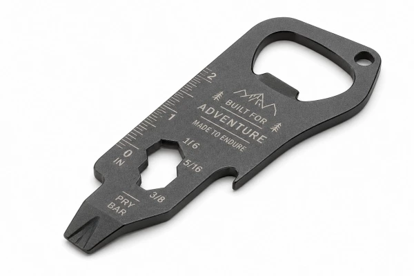 Laser etched metal multitool with precise markings, engraved text, and clean edge definition.