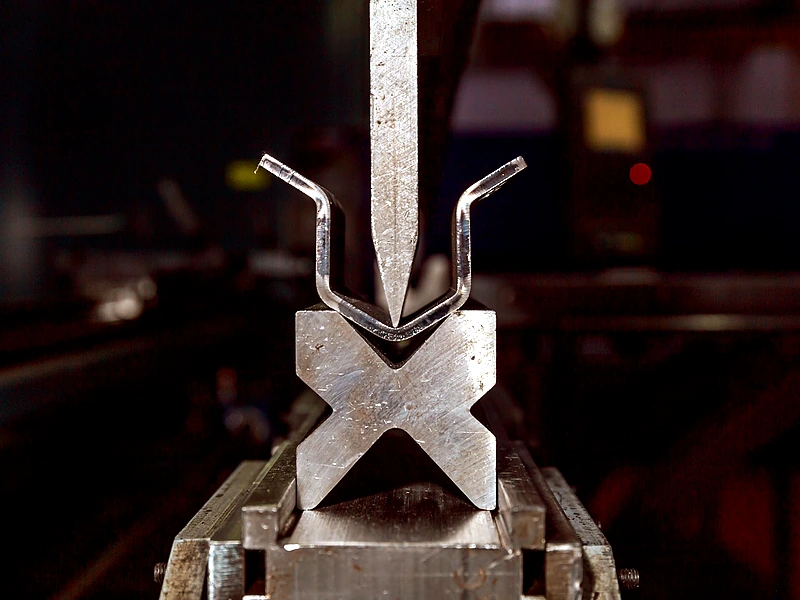 Press brake bending sheet metal profile for custom fabrication