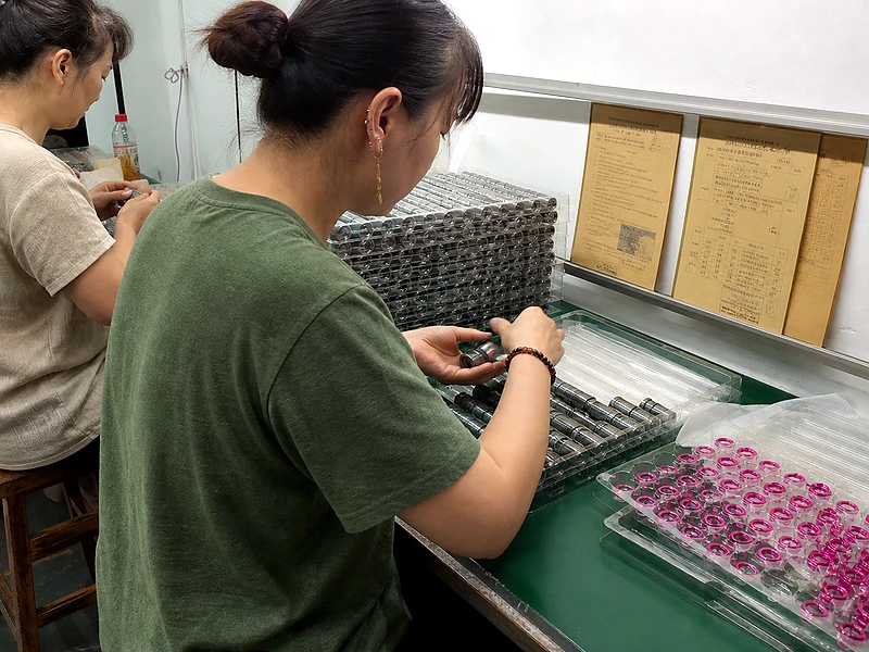 Quality check and packaging work for custom metal parts before shipment