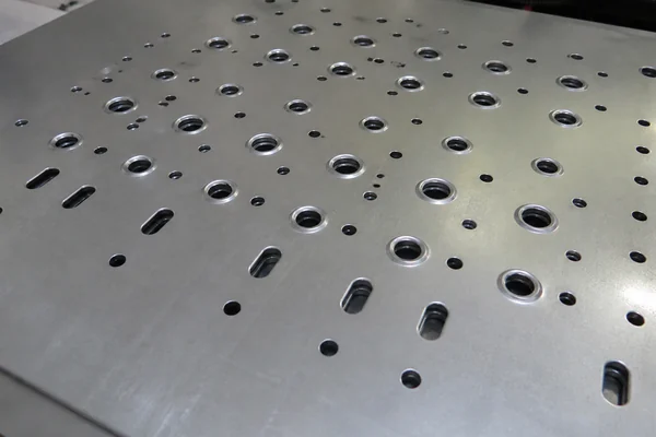 Sheet metal hole patterns and slot punching capability